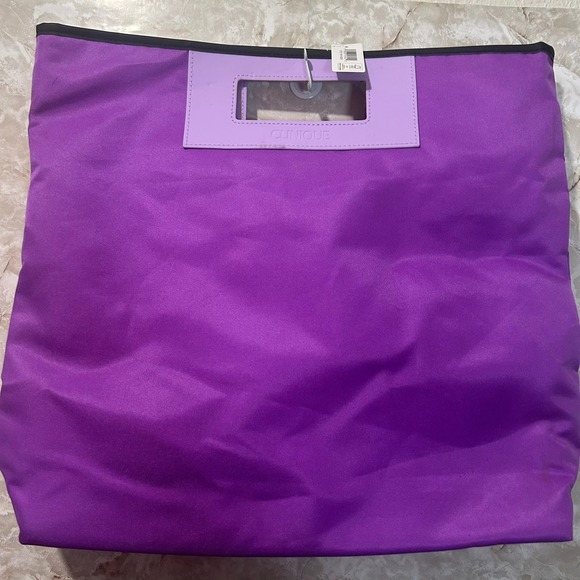 Clinique Handbags - Clinique Tote Bag Purple Travel Carry On Handbag Shopper Bag